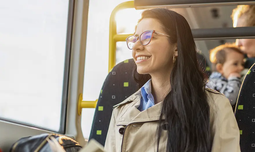 A happy rider using modern fare payment