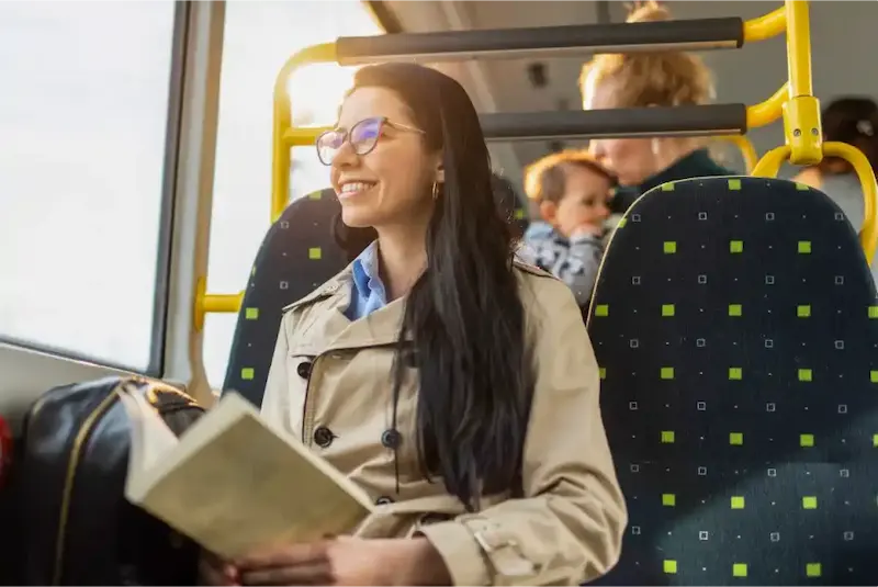 A happy rider using modern fare payment